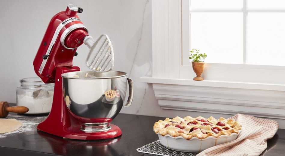 KitchenAid®  Pastry Beater cutting butter into flour
