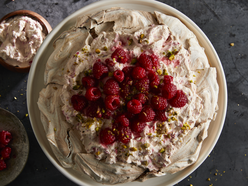 A chocolate pistachio pavlova with raspberry cream.