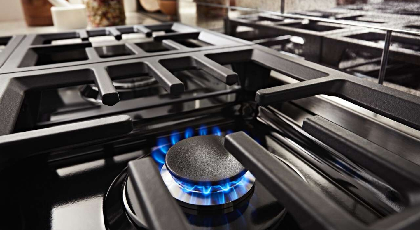 Close-up of the flame of a gas stovetop burner