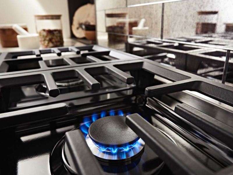 Close-up of the flame of a gas stovetop burner