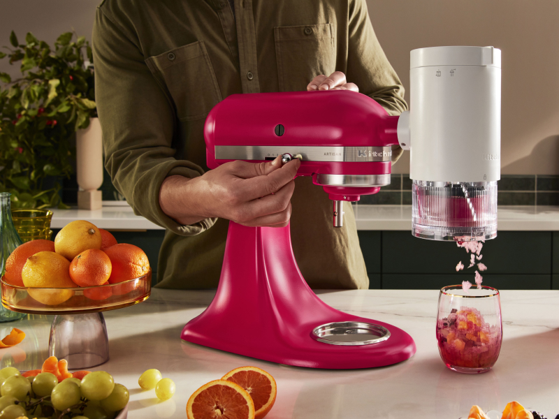 KitchenAid® stand mixer with shave ice attachment making frozen treats