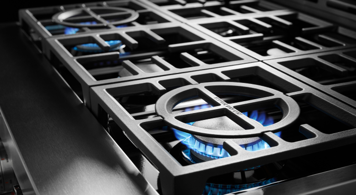 A closeup of a burner on a gas stove