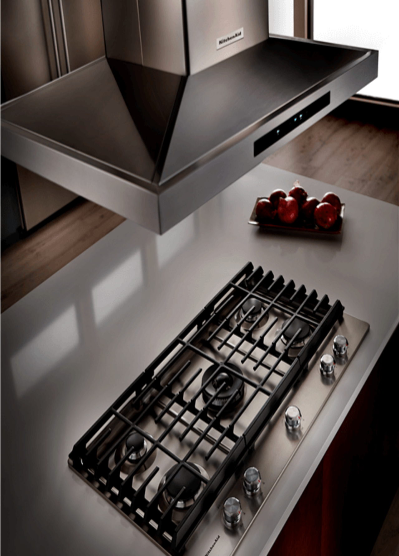 Island-mounted range hoods from KitchenAid.