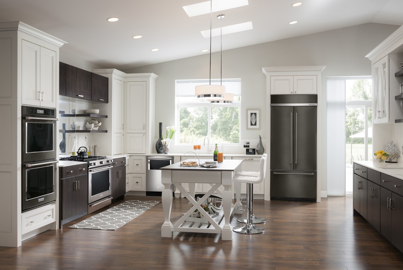 A bottom freezer built-in refrigerator keeps fresh foods within easy reach.