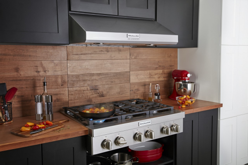 A dish cooking on a KitchenAid® cooktop