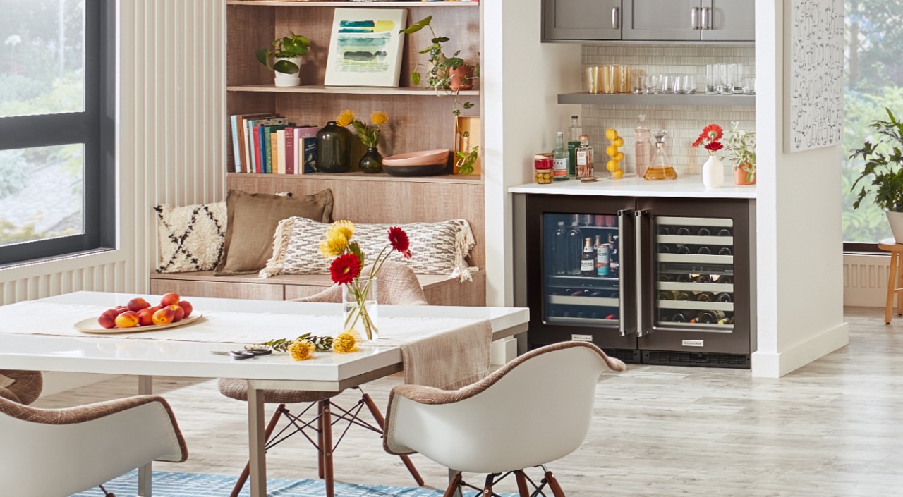 Kitchen table in front of wet bar and banquette Kitchen table in front of wet bar and banquette