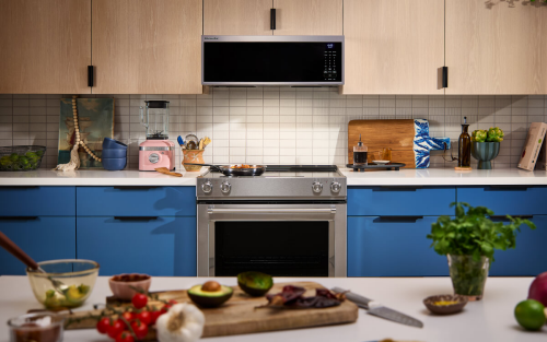Produce on a cutting board in a modern kitchen