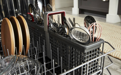 Utensils in a dishwasher utensil rack