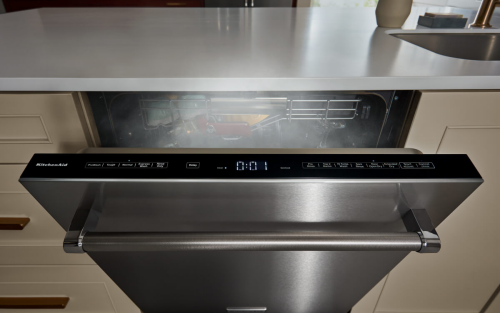 Dishwasher open with steam coming out