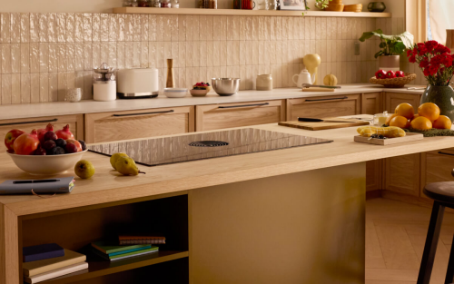 A modern kitchen with a wood island