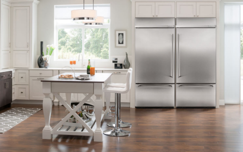 A kitchen featuring a KitchenAid® large capacity refrigerator 
