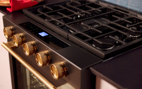 Close-up of a KitchenAid® range’s knobs