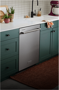 A loaded three rack dishwasher