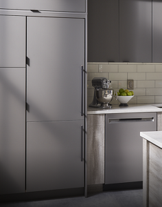 A gray panel-ready refrigerator inside of a kitchen