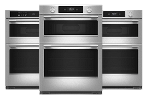 Three KitchenAid wall ovens.