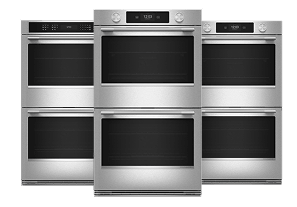 Three KitchenAid wall ovens.