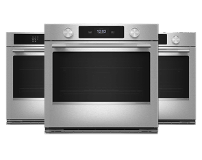 Three KitchenAid wall ovens.