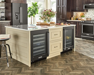  A kitchen island with wine coolers installed underneath