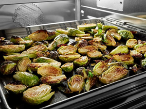 Cooked Brussels sprouts on a baking sheet