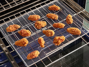 Cooked food in an air fry basket