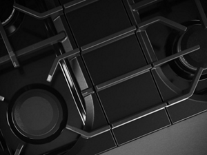 The burners and grates on a gas stovetop